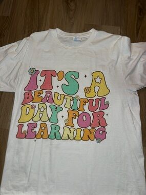 White Womens T-Shirt with Colorful 'It's a Beautiful Day for Learning' Graphic